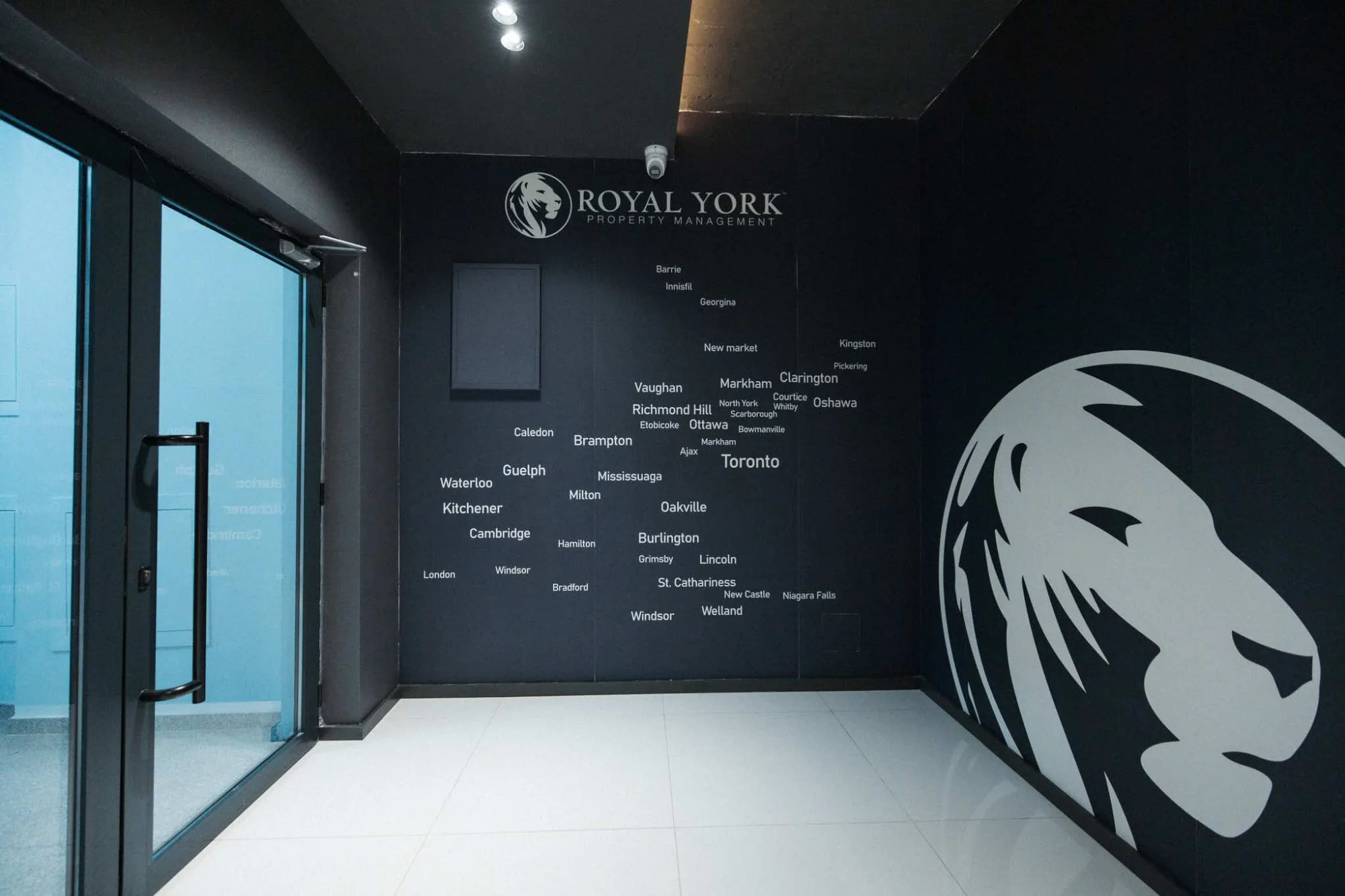 Royal York Property Management office with city names wall
